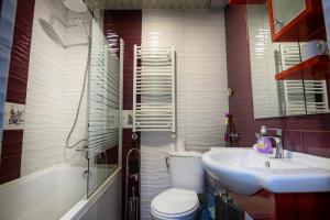 Ένα μπάνιο στο Апартамент за гости Римски терми