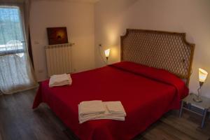 Letto o letti in una camera di Alghero in bicicletta