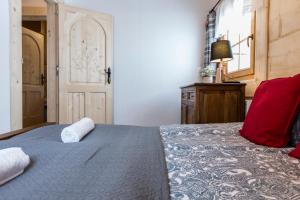 Posteľ alebo postele v izbe v ubytovaní udanypobyt Villa Sywarne Prestige