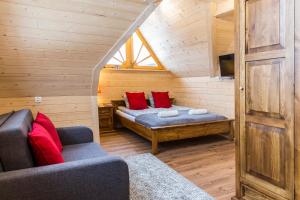 Posteľ alebo postele v izbe v ubytovaní udanypobyt Villa Sywarne Prestige