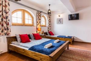 Posteľ alebo postele v izbe v ubytovaní udanypobyt Villa Sywarne Prestige