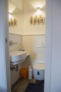 Ванна кімната в Alghero in bicicletta