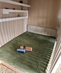 a suitcase sitting on the floor of a bunk bed at Cozy and comfortable apartment in Cherkasy