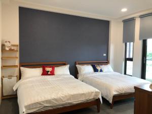Letto o letti in una camera di 逸家民宿 Yija
