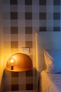 A bed or beds in a room at Casa Patrizi