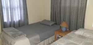 Postel nebo postele na pokoji v ubytování Tranquility PsJ