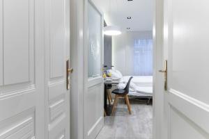 Posteľ alebo postele v izbe v ubytovaní Lampi Aparthotel Prague