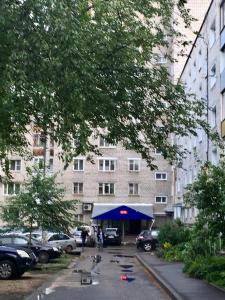 a street with a blue tent in front of a building at Apartment on Spasskaya 61 in Kirov