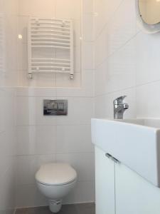 Ванная комната в Apartament Gliwice Centrum Fredry II