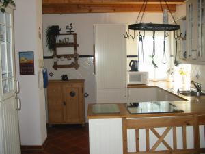 Kuchyň nebo kuchyňský kout v ubytování Ferienwohnung Am Pflanzgarten