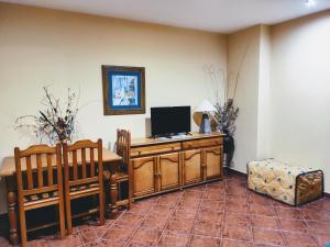 A television and/or entertainment centre at La Garzona