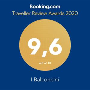 um símbolo para um prémio de revisão de viagens com um círculo amarelo em I Balconcini em Bérgamo