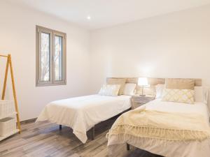 Postel nebo postele na pokoji v ubytování Villa margalida