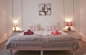 Кровать или кровати в номере Les coeurs de Cachemire
