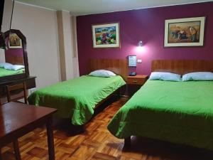 Lova arba lovos apgyvendinimo įstaigoje Hotel Las Lomas