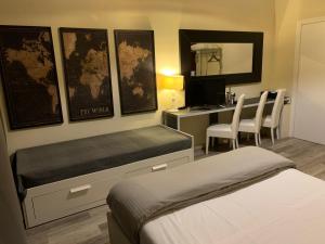 Postel nebo postele na pokoji v ubytování Rigoletto Rental Rooms