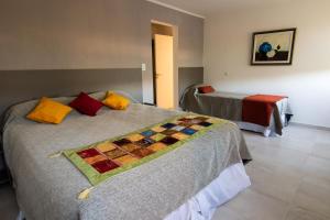 Ένα ή περισσότερα κρεβάτια σε δωμάτιο στο Hotel Las Piedras +33 φωτογραφίες