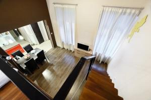 Televízia a/alebo spoločenská miestnosť v ubytovaní Arpa Flat Hellas
