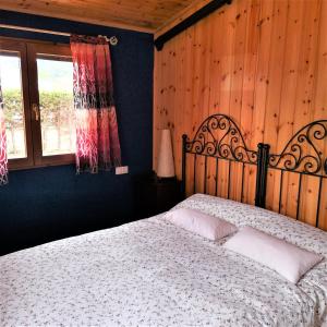 Postel nebo postele na pokoji v ubytování CON PISCINA CLIMATIZADA SANSIL RURAL Atapuerca + 21 fotografií
