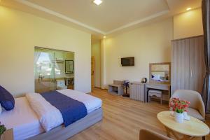 Postel nebo postele na pokoji v ubytování Khanh Uyen 1 Hotel