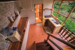 Kjøkken eller kjøkkenkrok på The Dusun