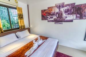 Ένα ή περισσότερα κρεβάτια σε δωμάτιο στο The Travelers Friend