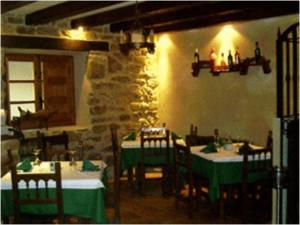 Un restaurante o sitio para comer en Centro de Turismo Rural El Recreo
