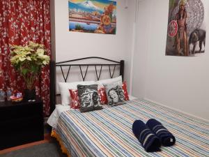 Кровать или кровати в номере Alameda House