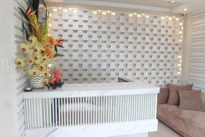 Area soggiorno di RNR Suites