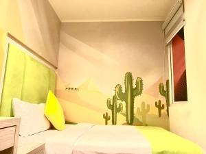 Postel nebo postele na pokoji v ubytování 墾丁合歡8宿-Ho Huan B & B