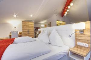 Postel nebo postele na pokoji v ubytování Hotel Jakob