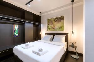 Ένα ή περισσότερα κρεβάτια σε δωμάτιο στο Nin&Bau Sarri 2