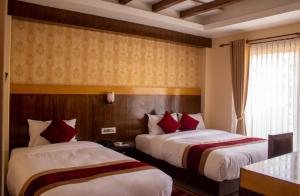 Postel nebo postele na pokoji v ubytování Hotel Silverline + 41 fotografií