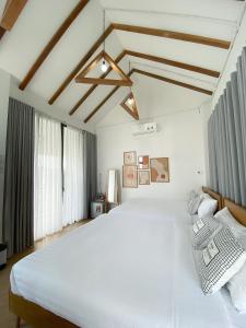 Ένα ή περισσότερα κρεβάτια σε δωμάτιο στο Daisy House