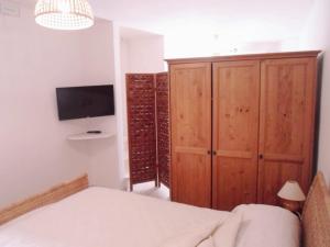 A bed or beds in a room at Sweet Home by Giò