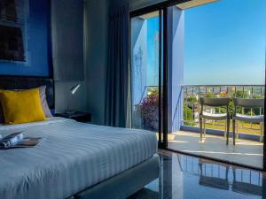 Giường trong phòng chung tại Sino Inn Phuket Hotel - SHA Plus +30 ảnh