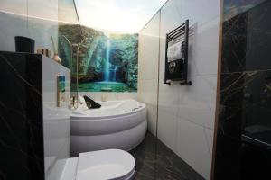 Kúpeľňa v ubytovaní Apartament Lema Versace + 18 fotografií