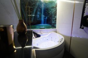 Kúpeľňa v ubytovaní Apartament Lema Versace