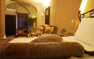 Posezení v ubytování Roma Cave Suite