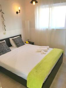 A bed or beds in a room at Villa Verde Még 29 kép
