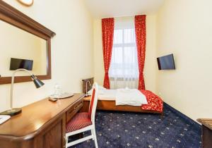 TV a/nebo společenská místnost v ubytování Hotel Marczewski