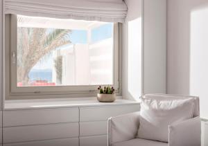 Uma área de estar em O Lofos Luxury Boutique Suites