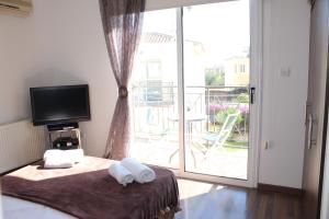 Ένα ή περισσότερα κρεβάτια σε δωμάτιο στο Natali villa in a perfect location +32 φωτογραφίες