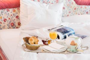 Posteľ alebo postele v izbe v ubytovaní Hotel Edelweiss