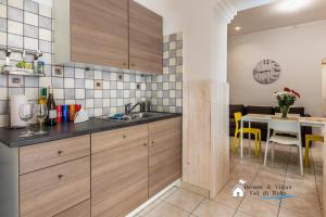 Kuchyňa alebo kuchynka v ubytovaní House&Villas - Sea Apartment