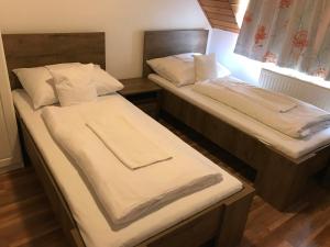 Posteľ alebo postele v izbe v ubytovaní Zöldtető Panzió