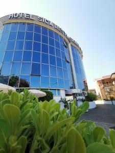 a hotel sign on the front of a building at Hotel Sica in Montecorvino Rovella