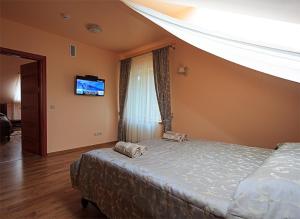 Postel nebo postele na pokoji v ubytování El Arm El