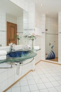 Koupelna v ubytování Hotel Obermaier