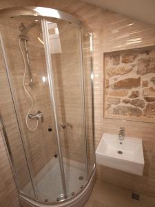 Kúpeľňa v ubytovaní Fokus seaview apartment + 28 fotografií